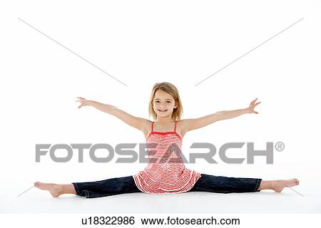 Young Girl In Gymnastic Pose Doing Splits View Large Photo Image Stock Photograph - Young Girl In Gymnastic Pose Doing Splits. Fotosearch