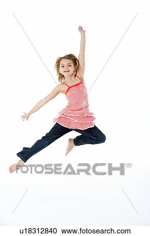 Stock Image - Young Girl Jumping In Mid Air. Fotosearch