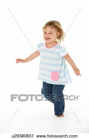 Young Girl Running In WhiteStudio View Large Photo Image Stock Photo - Young Girl Running In WhiteStudio. Fotosearch