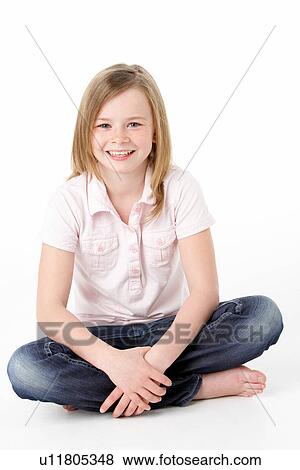 Young Girl Sitting In Studio View Large Photo Image Stock Photo - Young Girl Sitting In Studio. Fotosearch