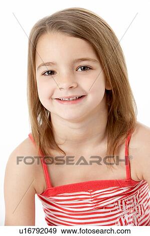 Stock Photo - Young Girl Sitting In Studio. Fotosearch