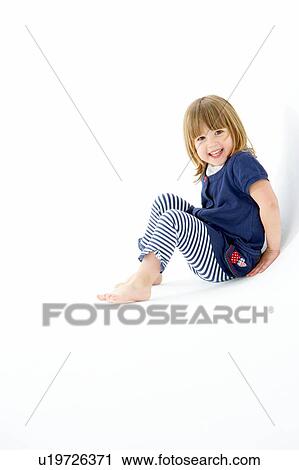 Young Girl Sitting In WhiteStudio View Large Photo Image Stock Image - Young Girl Sitting In WhiteStudio. Fotosearch