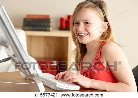 Young Girl Using Computer At Home View Large Photo Image Stock Image - Young Girl Using Computer At Home. Fotosearch