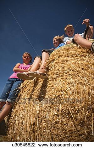 3 farm kids on bales; Redvers, Saskatchewan, Canada View Large Photo Image Stock Image - 3 farm kids on bales; Redvers, Saskatchewan, Canada. Fotosearch