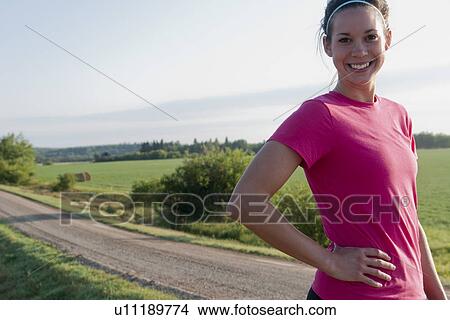 Athletic woman in countryside, Manitoba, Canada View Large Photo Image Picture - Athletic woman in countryside, Manitoba, Canada. Fotosearch