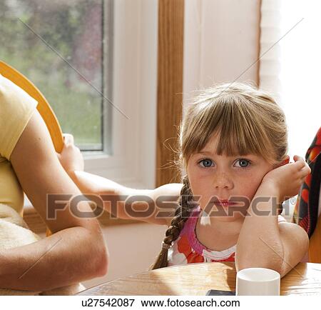 Five year old girl at kitchen table, Redvers, Saskatchewan, Canada View Large Photo Image Stock Photo - Five year old girl at kitchen table, Redvers, Saskatchewan, Canada. Fotosearch