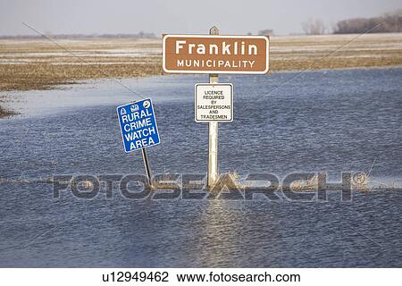 Floodwaters from Red River make field look like a lake, rural Manitoba View Large Photo Image Stock Image - Floodwaters from Red River make field look like a lake, rural Manitoba. Fotosearch