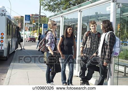 Group of teens at transit shelter, Winnipeg, Canada View Large Photo Image Stock Photograph - Group of teens at transit shelter, Winnipeg, Canada. Fotosearch