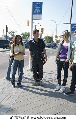 Group of teens waiting at transit junction, Winnipeg, Manitoba, Canada View Large Photo Image Stock Photo - Group of teens waiting at transit junction, Winnipeg, Manitoba, Canada. Fotosearch