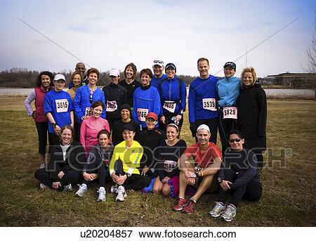 Stock Photo - Group portrait of running club, Regina, Saskatchewan. Fotosearch