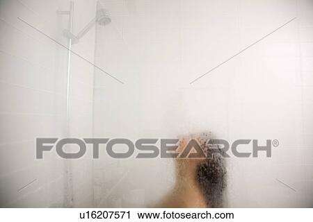 Head and shoulders view of woman in steamy shower stall with low flow faucet. View Large Photo Image Stock Image - Head and shoulders view of woman in steamy shower stall with low flow faucet.. Fotosearch