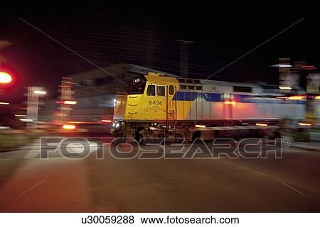 Stock Photo - Locomotive and passenger train at Brampton Ontario. Fotosearch