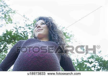 Low angle of very pregnant woman, Manitoba, Canada View Large Photo Image Stock Image - Low angle of very pregnant woman, Manitoba, Canada. Fotosearch