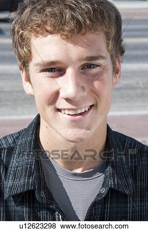 Stock Photo - Male Causcasian teen on street, Winnipeg, Manitoba, Canada. Fotosearch