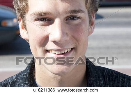 Stock Photograph - Male Causcasian teen on street, Winnipeg, Manitoba, Canada. Fotosearch