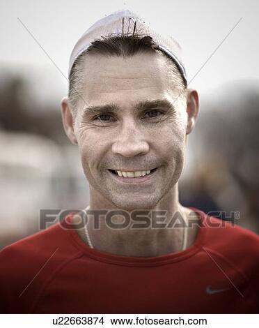 Portrait of middle aged male runner with white cap, Regina, Saskatchewan View Large Photo Image Picture - Portrait of middle aged male runner with white cap, Regina, Saskatchewan. Fotosearch