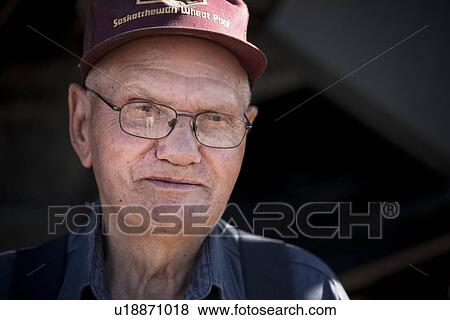 Stock Photo - Portrait of Senior Farmer, Redvers, Saskatchewan, Canada. Fotosearch