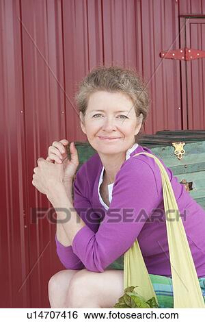 Portrait of woman with hemp shoulder bag, Manitoba, Canada View Large Photo Image Stock Photograph - Portrait of woman with hemp shoulder bag, Manitoba, Canada. Fotosearch