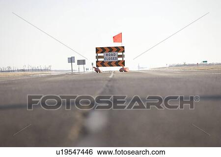 Road Closed sign in middle of highway, due to Red River flooding highway, rural Manitoba View Large Photo Image Stock Photograph - Road Closed sign in middle of highway, due to Red River flooding highway, rural Manitoba. Fotosearch