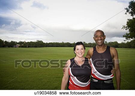 Senior male and female member of running club, in park, Regina, Saskatchewan View Large Photo Image Stock Photo - Senior male and female member of running club, in park, Regina, Saskatchewan. Fotosearch