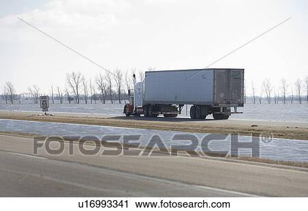Spring floodwater of Red River come close to covering highway View Large Photo Image Stock Image - Spring floodwater of Red River come close to covering highway. Fotosearch