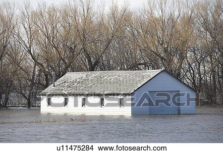 spring floodwater of Red River in farmyard, rural Manitoba View Large Photo Image Picture - spring floodwater of Red River in farmyard, rural Manitoba. Fotosearch