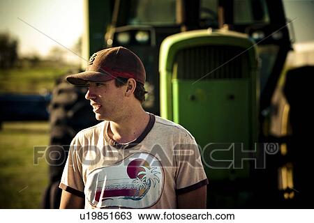 Young farmer in farmyard, Redvers, Saskatchewan, Canada View Large Photo Image Stock Image - Young farmer in farmyard, Redvers, Saskatchewan, Canada. Fotosearch