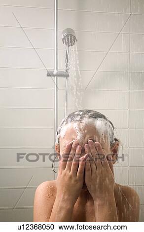 Young girl in low-flow shower View Large Photo Image Stock Image - Young girl in low-flow shower. Fotosearch