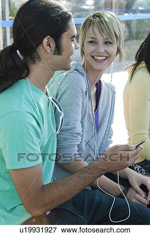 Young teen couple at transit shelter, Winnipeg, Manitoba, Canada View Large Photo Image Stock Photo - Young teen couple at transit shelter, Winnipeg, Manitoba, Canada. Fotosearch