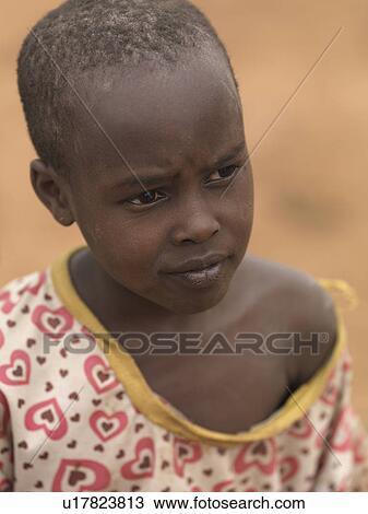Stock Image - African child in Maasai Village, Africa. Fotosearch