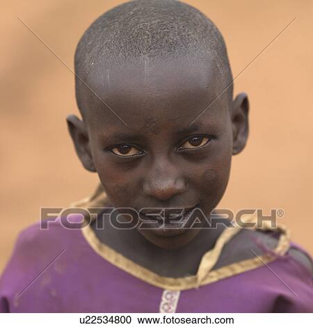 Stock Image - African child in Maasai Village, Africa. Fotosearch