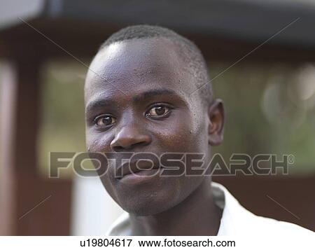 Stock Photo - African man looking at the camera. Fotosearch