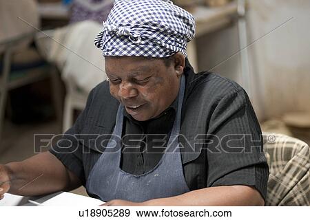 Stock Photo - African woman in headscarf. Fotosearch