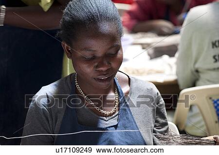 Stock Photo - African woman working. Fotosearch