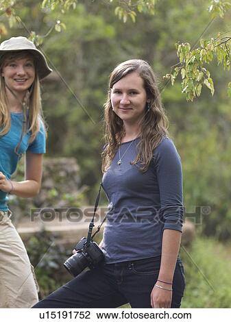 Stock Image - Caucasian brunette teenager in Kenya Africa. Fotosearch