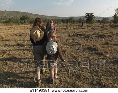 Stock Image - Caucasian tourists in Kenya Africa. Fotosearch