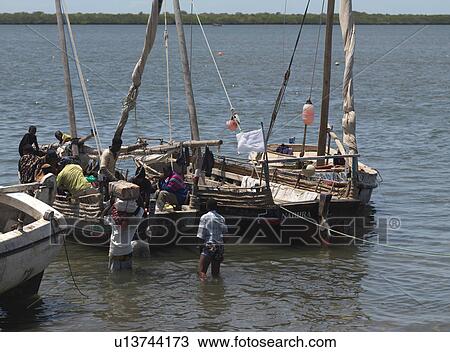 Stock Image - Fishing boats in Lamu Town, Africa. Fotosearch