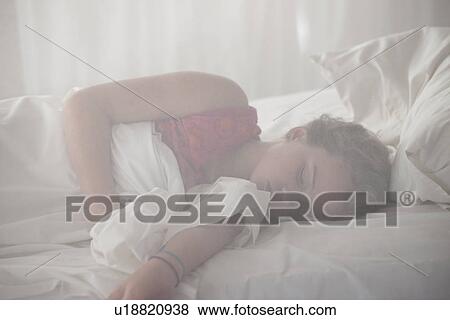 Girl sleeping at Manda Bay Resort View Large Photo Image Stock Photo - Girl sleeping at Manda Bay Resort. Fotosearch