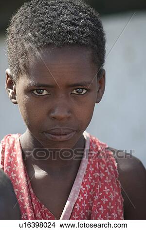 Picture - Kenyan girl in tribal attire. Fotosearch