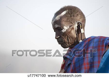 Kenyan man in tribal attire View Large Photo Image Stock Image - Kenyan man in tribal attire. Fotosearch