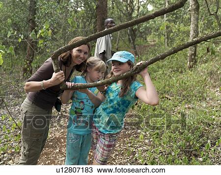 Mother and daughters posing for camera in Kenya Africa View Large Photo Image Stock Image - Mother and daughters posing for camera in Kenya Africa. Fotosearch
