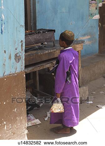 Stock Image - Muslim child in Lamu Town, Kenya Africa. Fotosearch