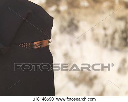 Stock Image - Muslim woman in Lamu Town, Kenya Africa. Fotosearch