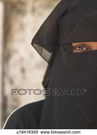 Stock Photo - Muslim woman in Lamu Town, Kenya Africa. Fotosearch