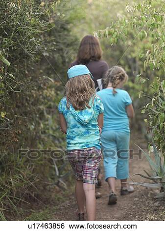 Stock Photograph - People hiking in Kenya Africa. Fotosearch