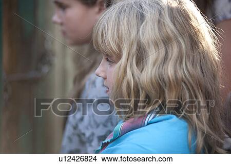Picture - Profile of blond girl. Fotosearch