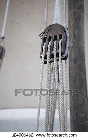 Stock Image - Ropes through a pully. Fotosearch
