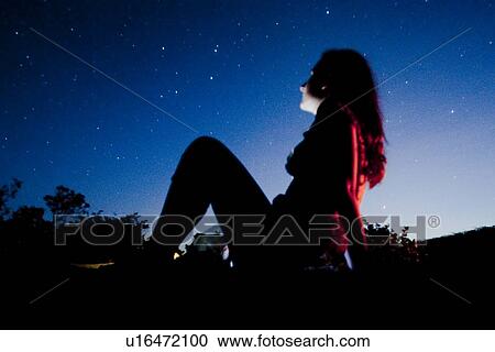 Silhouette of a girl against Kenya sky at sunset View Large Photo Image Stock Image - Silhouette of a girl against Kenya sky at sunset. Fotosearch