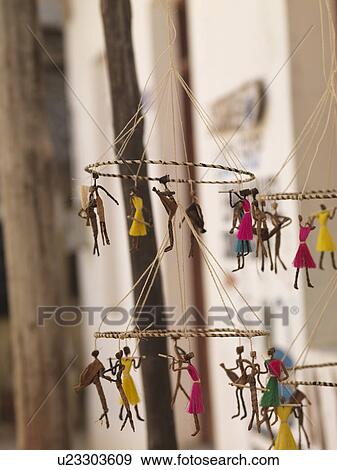 Stock Photo - Suspended puppets on display in Lamu Town, Kenya Africa. Fotosearch