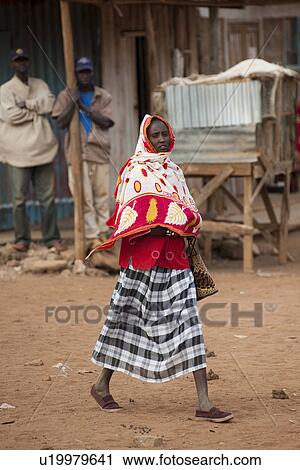 Stock Image - Villagers in Kenya. Fotosearch